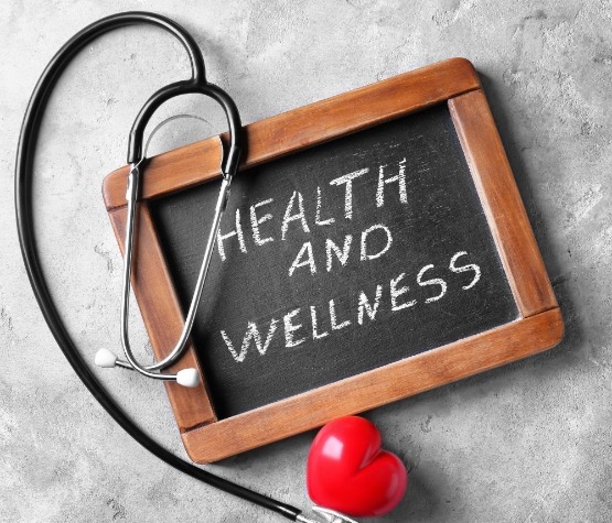 small chalk board with health and wellness written on it.