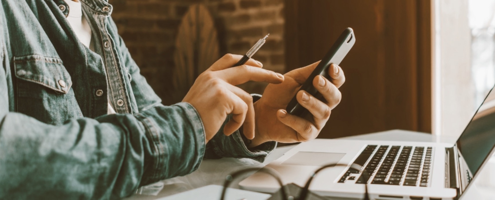 a person using their mobile phone