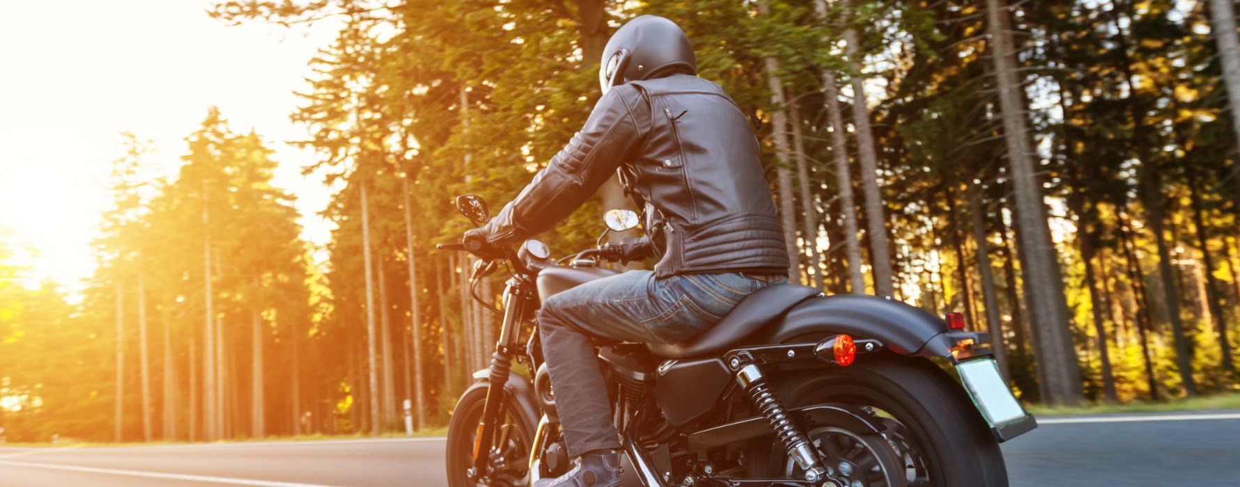 a person riding their motorcycle
