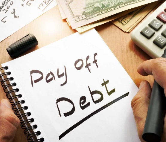 a pad with pay off debit written